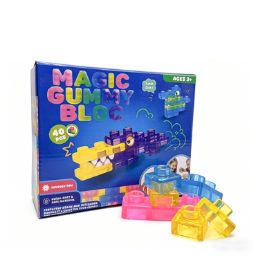 Sunburst Fun Magic Gummy Blocks toy set, showing the blue retail box with colorful text and illustrations alongside several translucent gummy building blocks in pink, blue, and yellow on a white background.