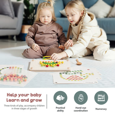 Two children playing with educational toys on the floor in a living room.